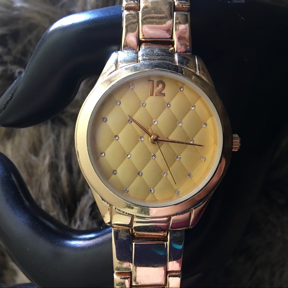 Ladies gold tone steel quilted rhinestone watch